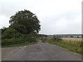 TM2997 : End of Kirstead Green & bridleway to the B1332 Norwich Road by Geographer