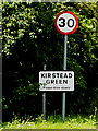 TM2996 : Roadsign & Kirstead Green Village Name sign by Geographer