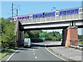 SJ8479 : Railway Crossing the Wilmslow Handforth Bypass by David Dixon