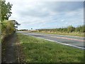 NY2347 : Pavement joining the A596, west of Wigton by Christine Johnstone