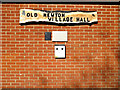 TM0562 : Old Newton Village Hall sign by Geographer