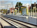 SJ8090 : Northern Moor Metrolink Stop, Outbound Platform by David Dixon