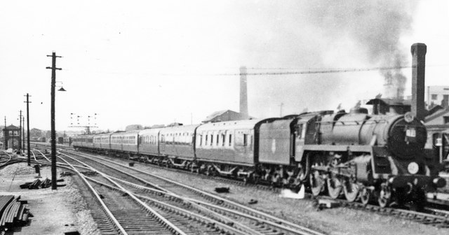 Ilfracombe - Waterloo express rushing through Basingstoke, 1957