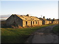 NT4265 : Derelict farm cottages at Peaston by M J Richardson