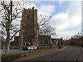 TM4656 : A1094 Victoria Road & St.Peter & St. Paul's Church by Geographer