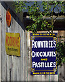 SP0472 : Old enamel advertising signs on a shed, Rowney Green by Robin Stott