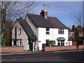 SK3134 : A pair of old cottages by Ian Calderwood