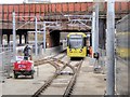 SJ8499 : Tram Approaching Victoria Station (February 2015) by David Dixon