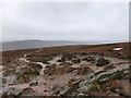 NS7224 : Eroded ground on Cairn Table by Alan O'Dowd