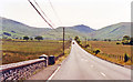 SH7616 : Southward on A487 to Minfford near Cross Foxes Hotel, 1992 by Ben Brooksbank