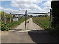 TM4563 : Entrance Gates of Leiston Sewage Treatment Works by Geographer