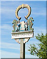 TF6833 : Snettisham village sign (detail) by Adrian S Pye