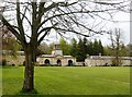 NZ0284 : The entrance gatehouse and central green, Wallington, Northumberland by Derek Voller