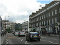 TQ2984 : Camden Road, outside Sainsbury's by Christopher Hilton