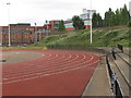 TQ2281 : Running track, Linford Christie Stadium by David Hawgood