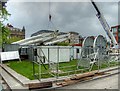 SJ8498 : Dismantling and Removing the Manchester Wheel from Piccadilly Gardens by David Dixon