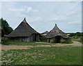 SU7116 : Butser Ancient Farm - Two roundhouses by Rob Farrow