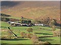 NY2219 : Birkrigg Farm seen from across Newlands by Graham Robson