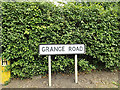 TM0969 : Grange Road sign by Geographer