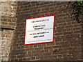 TL1313 : Railway Bridge sign on Crabtree Lane Railway Bridge by Geographer