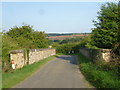 SP9198 : Bridge over an old railway near Seaton by Marathon