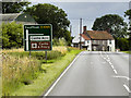 TF8315 : Southbound A1065 approaching the George and Dragon by David Dixon