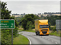 TF9130 : Yellow HGV on A1065 near Fakenham by David Dixon