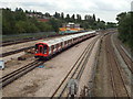 TQ1887 : London Underground train approaching Preston Road station by Malc McDonald