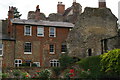 TL8564 : Bury St Edmunds: houses embedded in the abbey ruins by Christopher Hilton