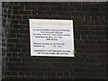 TQ6195 : Railway sign on Hutton Road Railway Bridge by Geographer