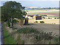 NT8958 : Barn and bales, Blackburn Farm by Oliver Dixon