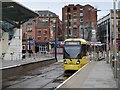 SJ8498 : Tram Arriving at Shudehill Interchange by David Dixon