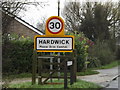 TL3758 : Hardwick Village Name sign on Main Street by Geographer