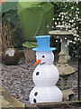 SP9111 : A Snowman in a garden in Miswell Lane, Tring by Chris Reynolds