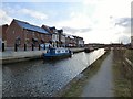 SJ9097 : Narrowboats at Droyslden by Gerald England