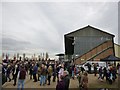 TF9228 : Grandstand and crowd at Fakenham Racecourse by Richard Humphrey