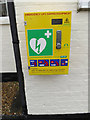 TM3067 : Defibrillator at Badingham Village Hall by Geographer