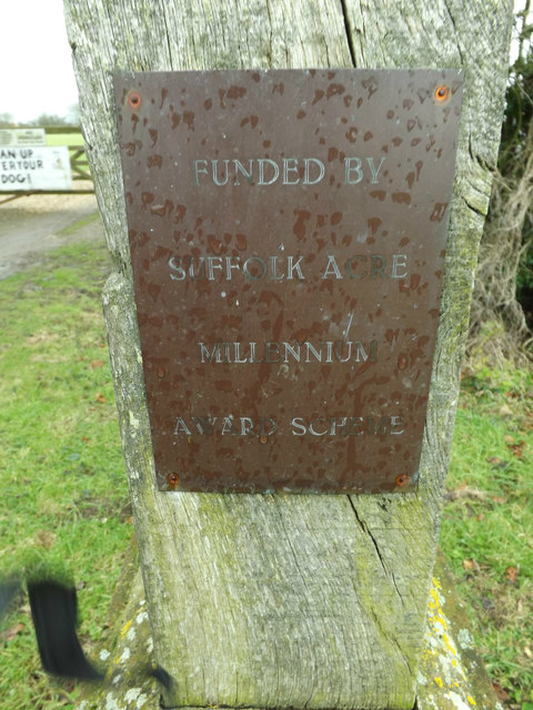 Plaque on Bedfield and Monk Soham sports field sign