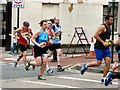 SJ9594 : Hyde 7 Road Race: Runners passing Vernon Street by Gerald England