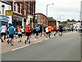 SJ9594 : Hyde 7 Road Race: Runners at the top of Market Street by Gerald England