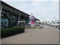 TQ1157 : Seating area at entrance to Extra Cobham Services by Peter Holmes