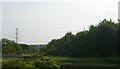 SO9891 : Gower Branch Canal: fleeting glimpse from the railway by Christopher Hilton