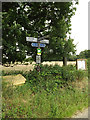 TL9879 : Grit Bin, Roadsign & Village Notice Board by Geographer