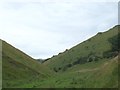 SK1056 : Down the valley between Wetton Hill and Sugar Loaf by Gary Rogers