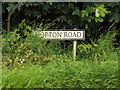 TM0080 : Hopton Road sign by Geographer