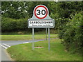 TM0080 : Garboldisham Village Name sign on the B1111 Hopton Road by Geographer