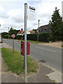 TM0383 : Bus Stop sign off The Street by Geographer