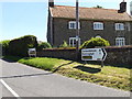 TM0487 : Roadsigns on Kenninghall Road by Geographer