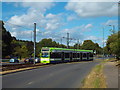 TQ3663 : Tram leaving Addington Village by Malc McDonald