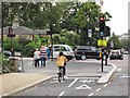 TQ2679 : Cycle and pedestrian traffic lights on cycle superhighway, Hyde Park by David Hawgood